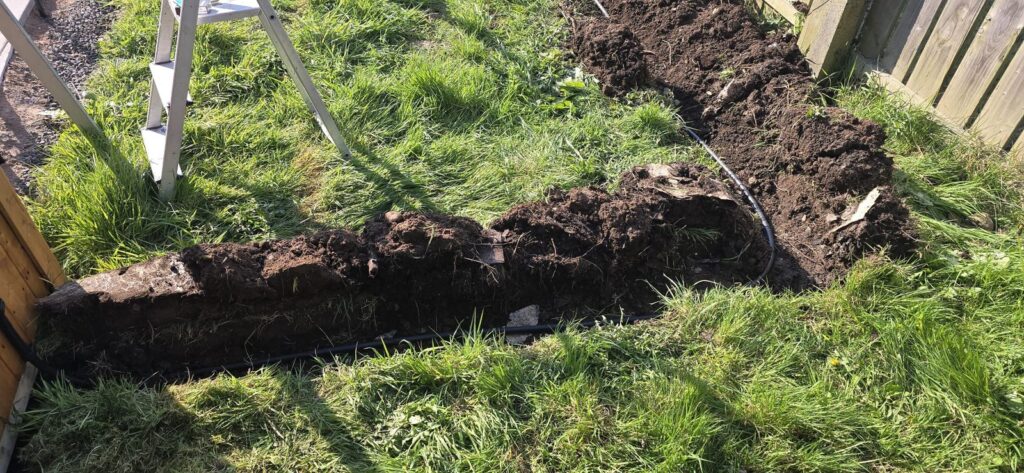 Armoured cable laid to outbuilding